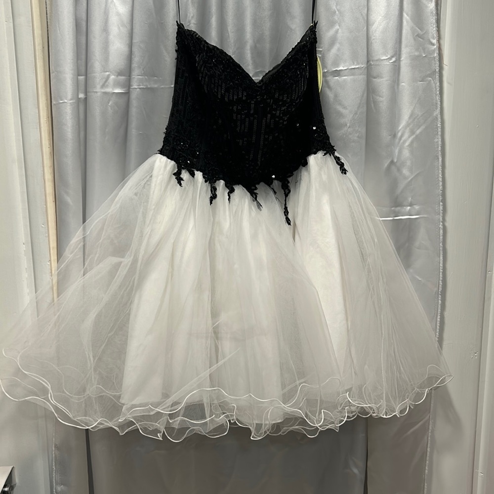 Strapless black sequin and white tulle dress